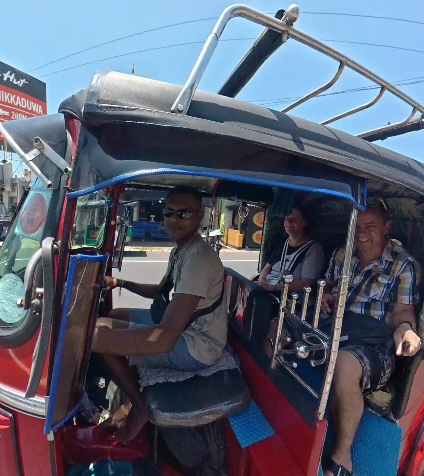 Tourists with Dinesh on his Tuk-tuk